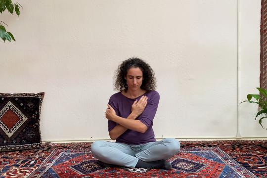 Alexandra Johnson practicing Self-Breema exercise at the Breema Center